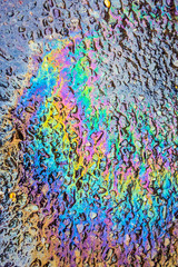 Fototapeta premium Oil Petrol Pollution Rainbow Spill on A Road