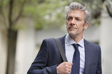 Portrait of businessman outdoors