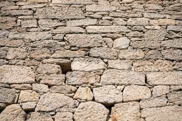 Ancient wall of dry masonry detail