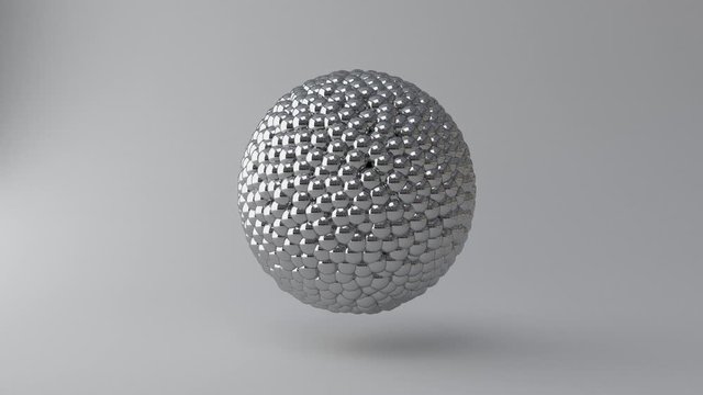 Relaxing Sphere Animation. Rolling spheres in another sphere in front of a grey background.