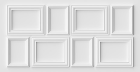 White photo or picture frames on the white wall with shadows