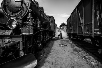 Fototapeta na wymiar Smoking steam train