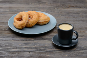 Breakfast coffee with donuts