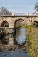 Fototapeta premium Bridge at the Leipzig Karl Heine canal between city center and Lindenauer harbor. The bridge has the German inscription King Albert Bridge