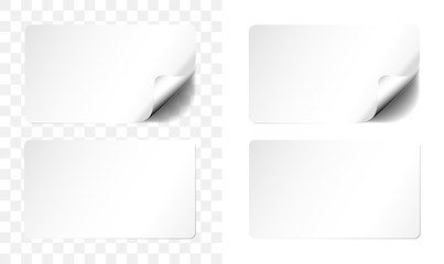 white adhesive label or sticher in two variations, one with curled up corner and transparent shadow