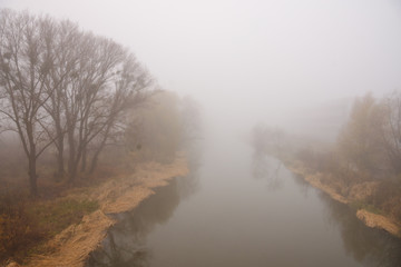 Obraz na płótnie Canvas The river in the mist