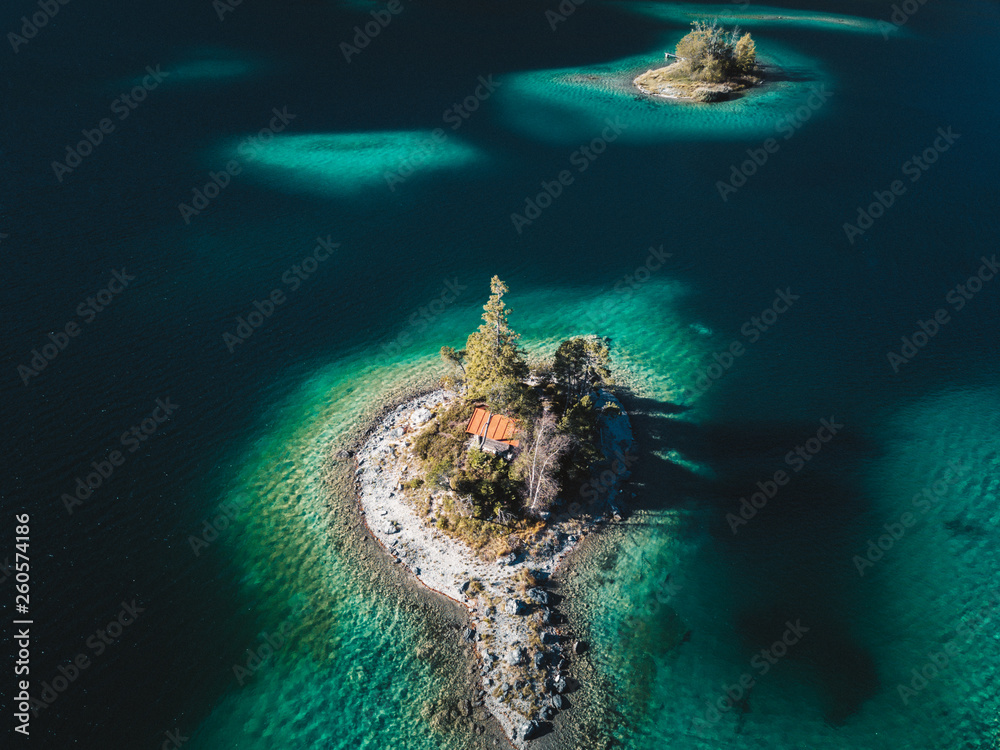 Wall mural Aerial drone view of the beautiful Lake Eibsee at the base of the Zugspitze peak in the Bavarian Alps,Germany