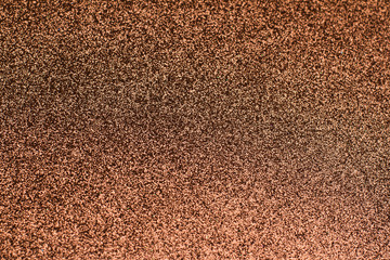brown copper glittering background closeup