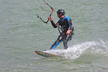 kitesurfer carving a turn