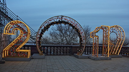 Lighting inscription 2019 on Observation deck Vorobyovy Gory in the spring Moscow eveningning