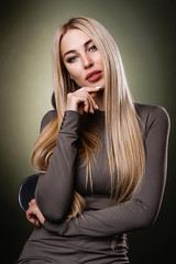 Fototapeta premium Blonde in a business suit. Portrait