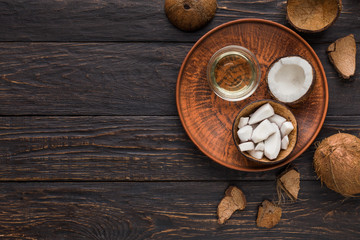 Coconut products over wooden background