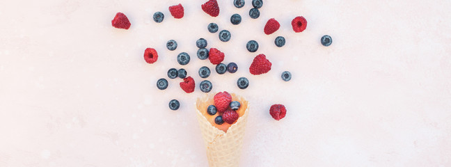 Summer composition berries ice cream waffle cone