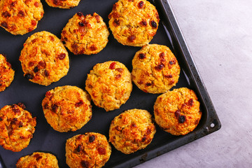 Baked cottage cheese and oatmeal cookies with raisins. Healthy nutrition, diet food.