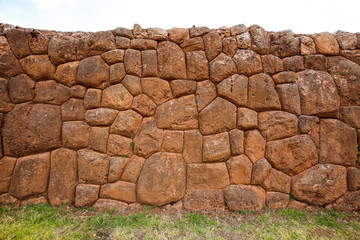 Inca wall in the ruins of Chinchero in Peru.