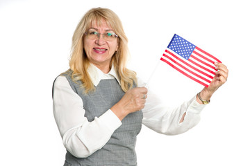 Happy mature woman with flag of United States of America, isolated on white background.