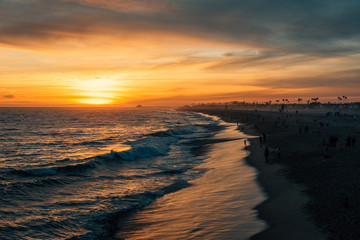 Vibrant sunset over the beach from the Balboa Pier, in Newport Beach, Orange County, California