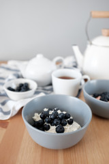 Healthy breakfast with cottage cheese and blueberries