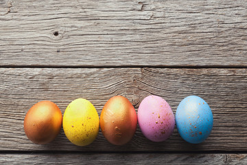 Easter eggs on wooden background.