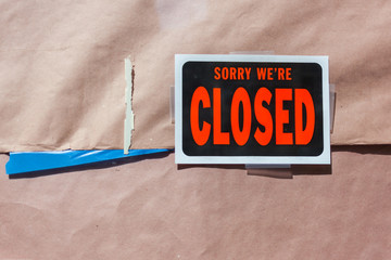 Business closed sign on the front door