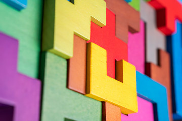 Geometric shapes on a wooden background.