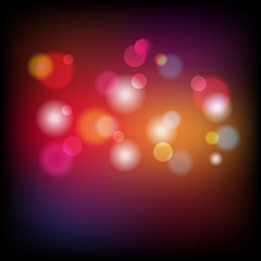 Abstract light bokeh on dark background.