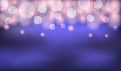 Abstract light bokeh on dark background.