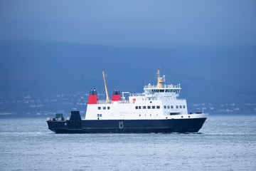 Fototapeta na wymiar Ship ferry landing arrival at dock port at Wemyss Bay Inverclyde Scotland
