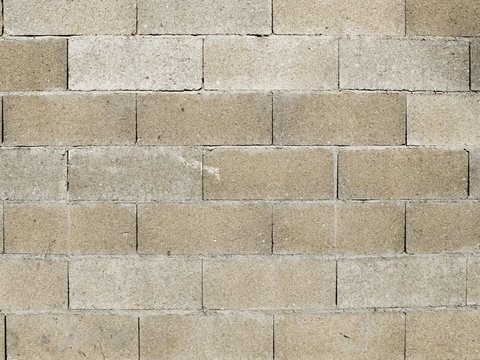 Mur de briques en parpaing gris de forme r&eacute;ctangulaires