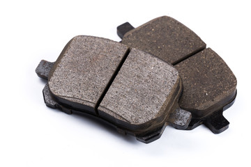 Set of brake pads, car spares isolated on white background