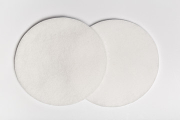 Cotton pads isolated on white background. Top view