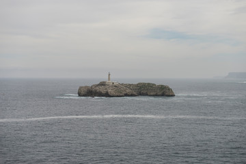 Camel beach famous for animal-shaped rock by the sea in the city of Santander, Spain
