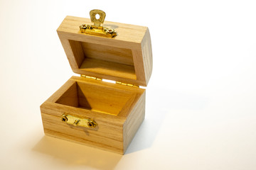 Open raw wooden box for small items on white background