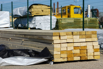 stack of wooden plank for construction work at warehouse storage