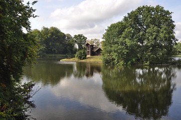 Wooden house on the lake in Denmark