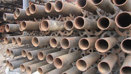 stack of iron pipes