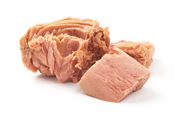 Preserved Pork Meat pieces, canned tuna, close-up, isolated on white background