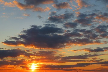 Beautiful fiery orange sunset over the city, natural background