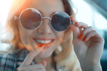 blonde spring sunglasses / happy girlfriend in a spring sunny image, sunglasses