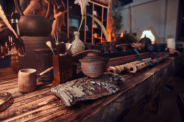 Set of accessories, ceramic cups and teapots, dry herbal leaves, all for making a natural delicious aromatic tea. Traditional Asian tea ceremony