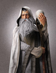 Portrait of a fantasy white wizard with a staff and a backdrop background. 3d rendering © Digital Storm