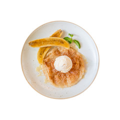 Top view of sweet roti served with vanilla icecream and fresh banana isolated.