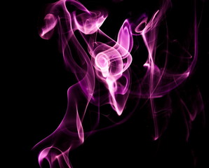 Purple smoke on black background