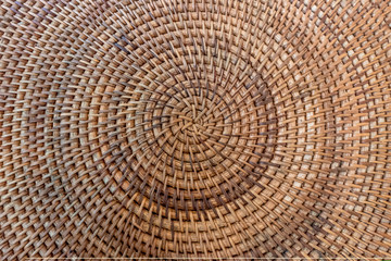 Top view of handmade rattan basket weaving craft.