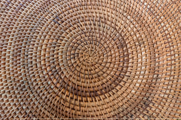 Top view of handmade rattan basket weaving craft.