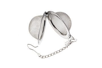 Tea strainer on a chain isolated for white background. A tea strainer is a kitchen accessory close-up.