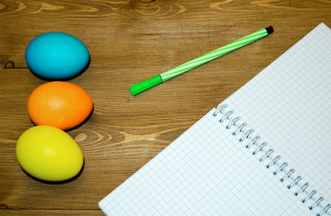 Easter eggg on wooden background