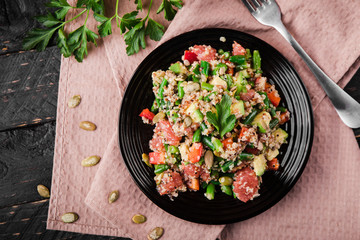healthy salad with quinoa, vegetables and grapefruit