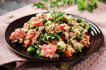 healthy salad with quinoa, vegetables and grapefruit