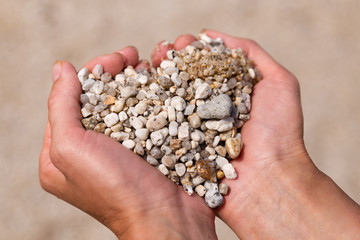 Heart symbol in feminine hand